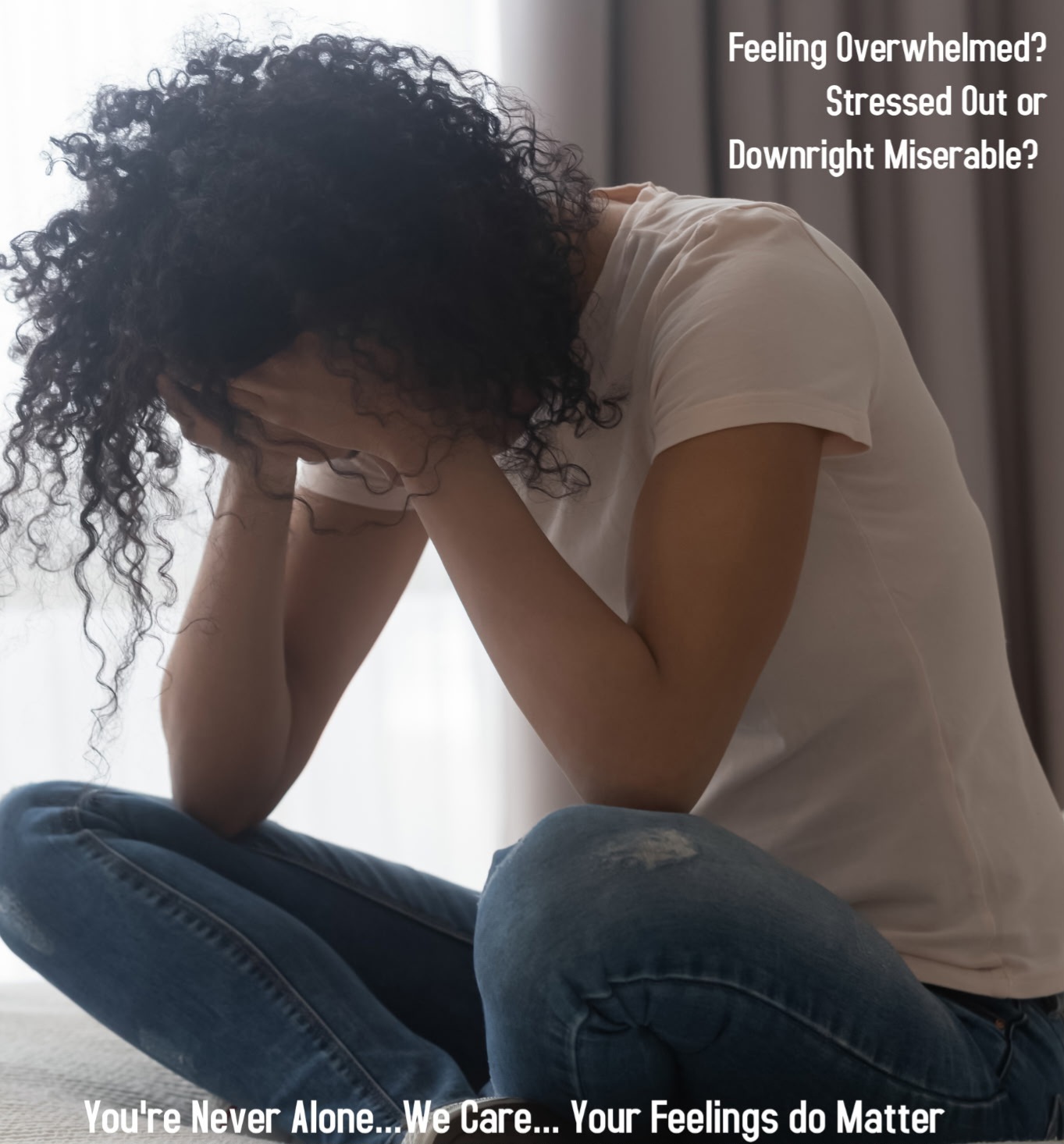 A woman seeking comfort — you're never alone, we care, your feelings do matter.